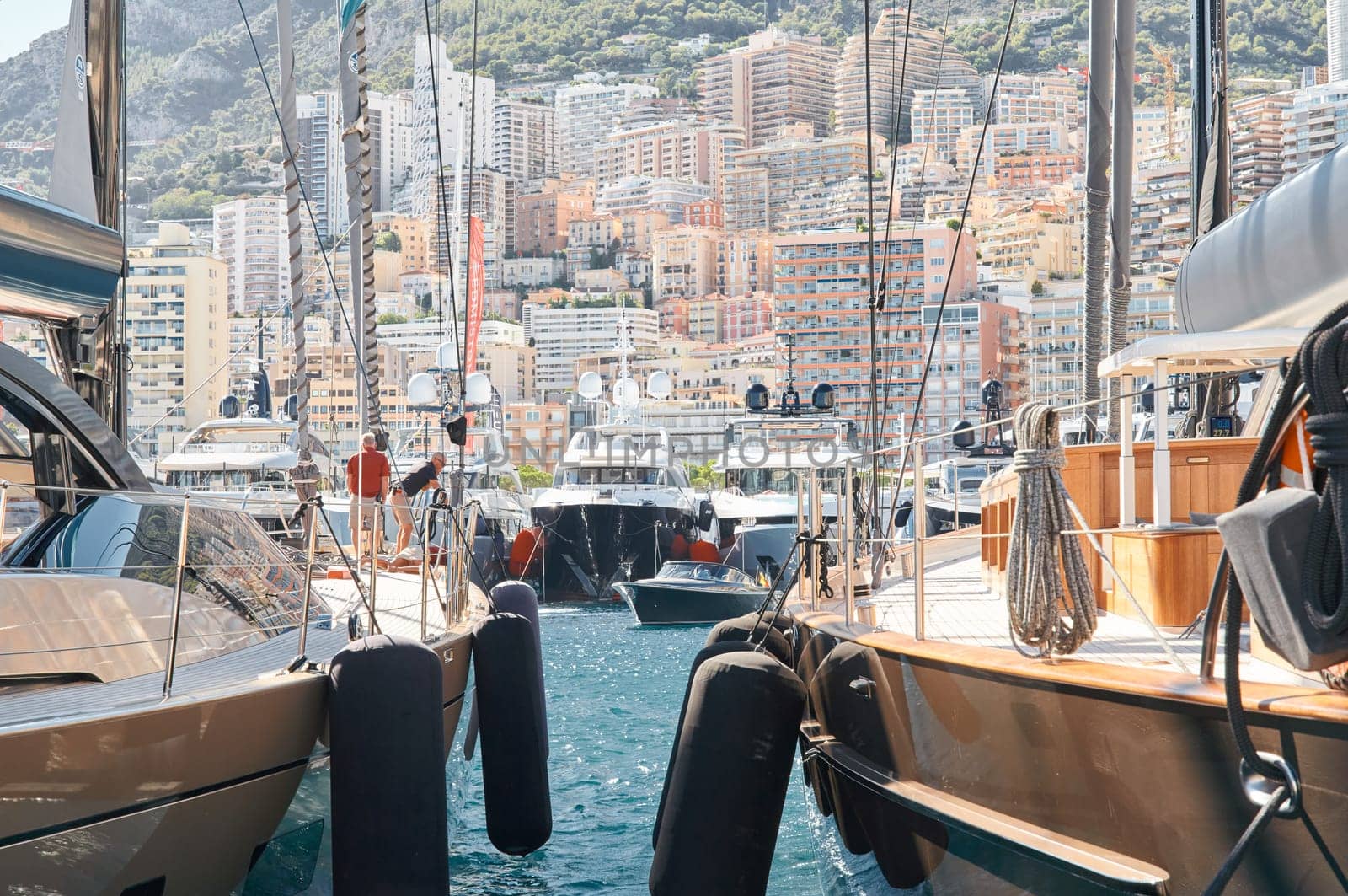 Monaco, Monte Carlo, 28 September 2022 - view on the famous yacht show through sailing yacht, exhibition of luxury mega yachts, yacht brokers. High quality photo