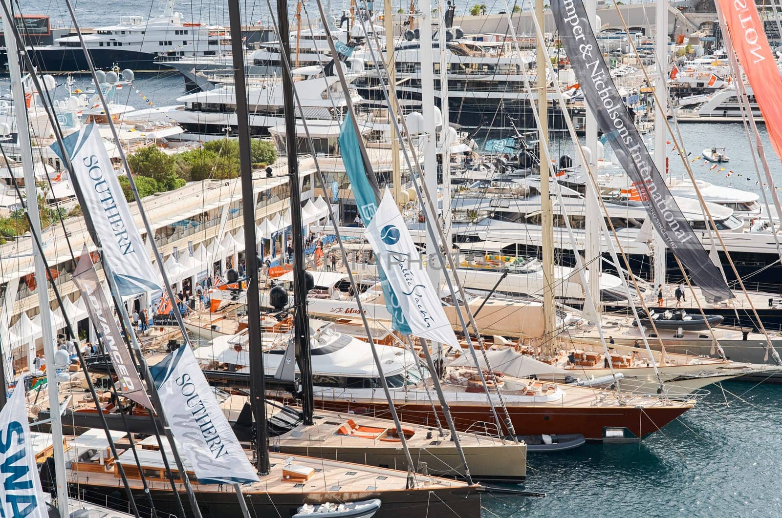 Monaco, Monte Carlo, 29 September 2022 - a lot of luxury yachts at the famous motorboat exhibition, the most expensive boats for the richest people, yacht brokers, boat traffic. High quality photo