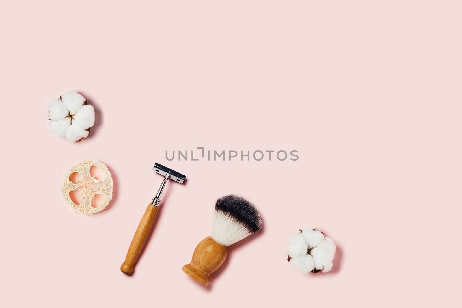 Zero waste accessories on pink background. by AlexAbramova