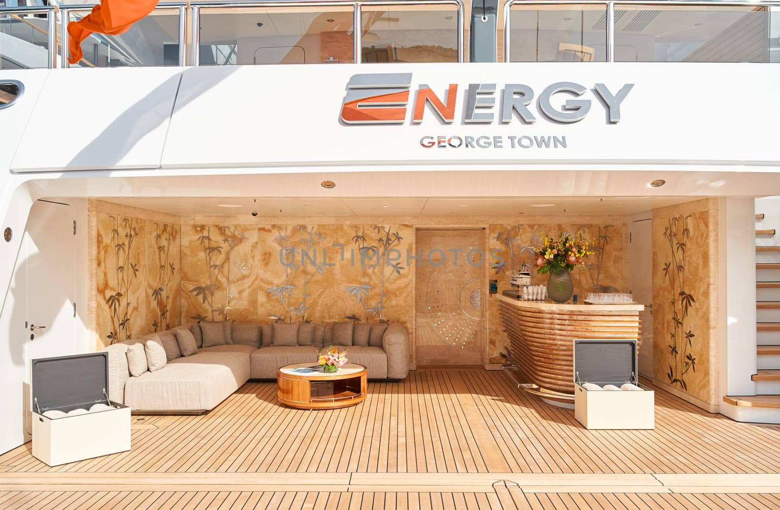 Monaco, Monte Carlo, 29 September 2022 - Close-up view of a relaxation area on the open teak deck of an expensive mega yacht on famous boating exhibition at sunny day, yacht show, wealth life by vladimirdrozdin