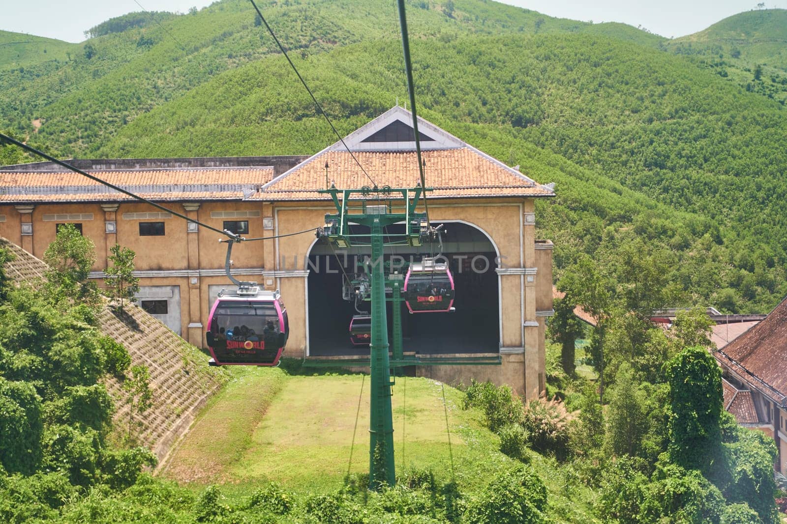 Da Nang, Vietnam - 29.06.2023: The famous and longest cable car to the French village of Ba Na Hills in Vietnam by driver-s
