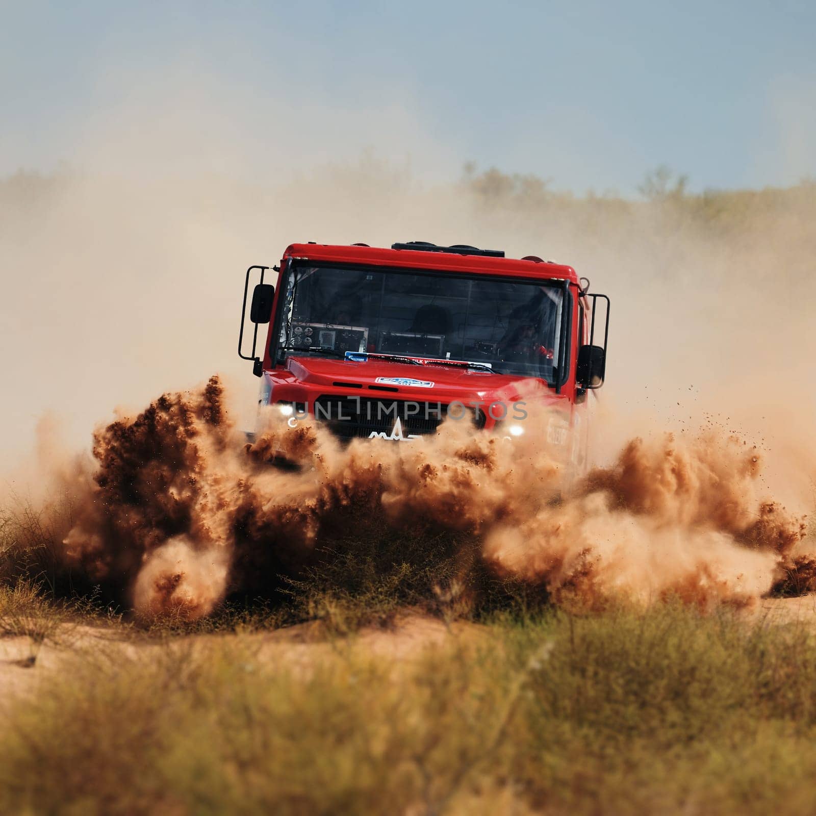 Extreme off-road racing. Sports truck MAZ Sport-auto team gets over the difficult part of the route during the Rally raid in sand. 14.07.2022 Kalmykia, Russia by EvgeniyQW