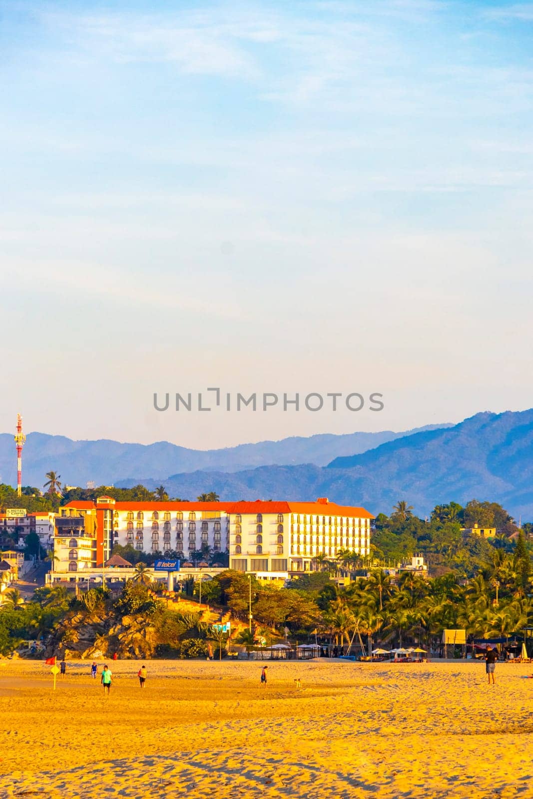 Puerto Escondido Oaxaca Mexico 16. November 2022 Beautiful tropical and natural city and seascape landscape panorama view with pacific ocean sea palms palm trees and beach with waves of Zicatela.