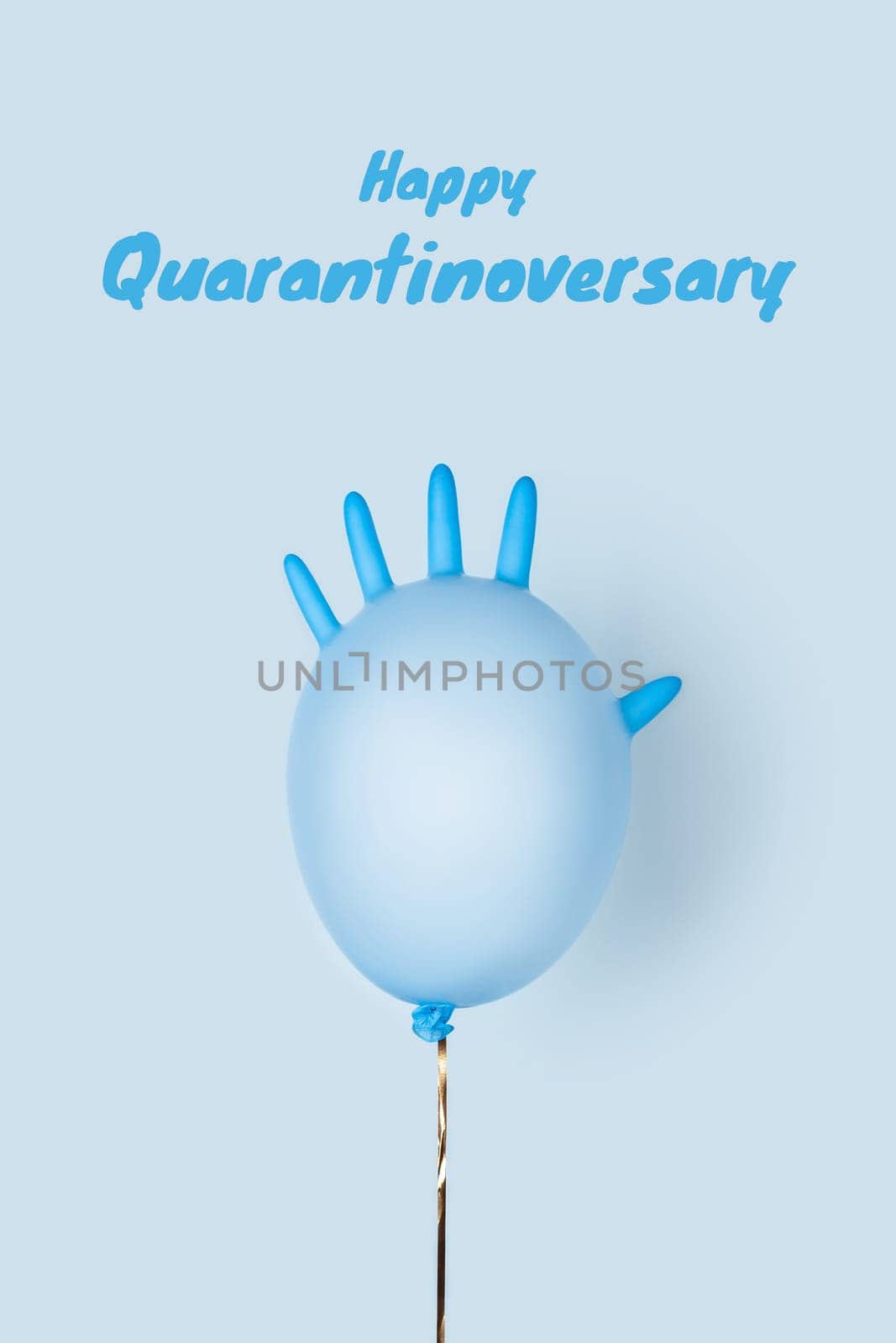 Happy anniversary concept on self-isolation and social distancing. A festive ball made of medical glove on a blue background.