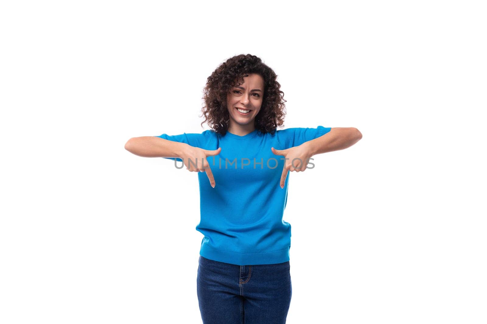 young bright smiling woman with curls dressed in a blue t-shirt with mockup by TRMK