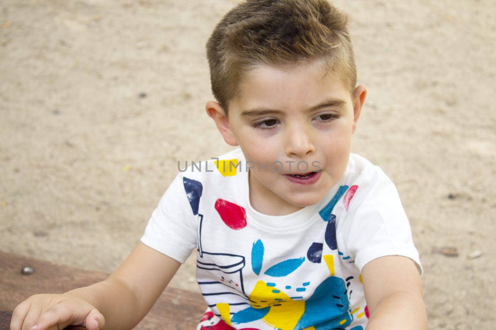 Portrait of four year old boy gesturing by GemaIbarra