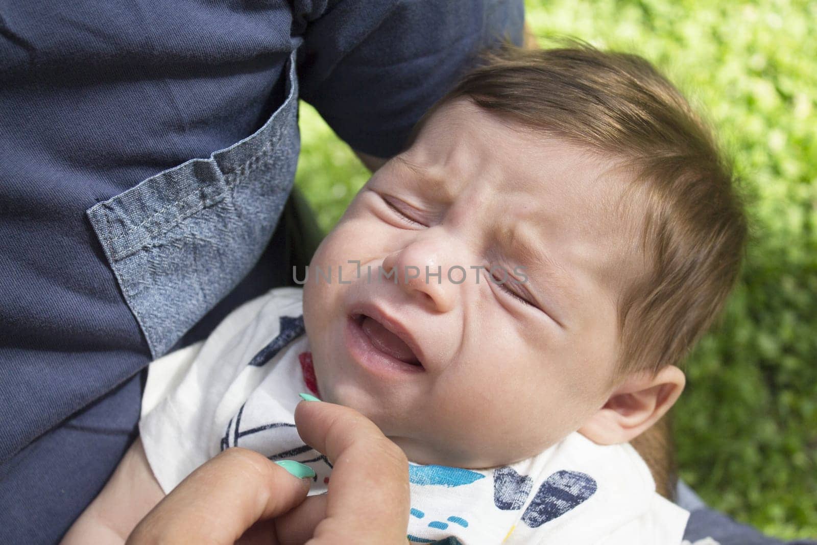 Two month old baby crying. So angry