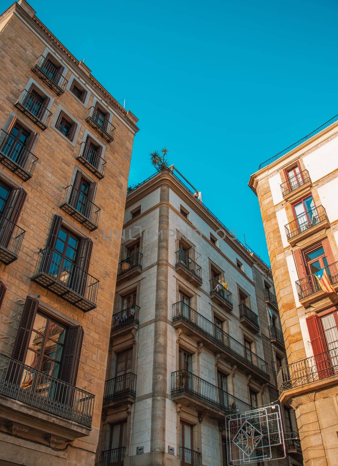 Empty street at sunset time in Barcelona, Spain photo. Historical building on Rambla street cityscape image. Beautiful urban scenery photography. Street scene. High quality picture for wallpaper, article