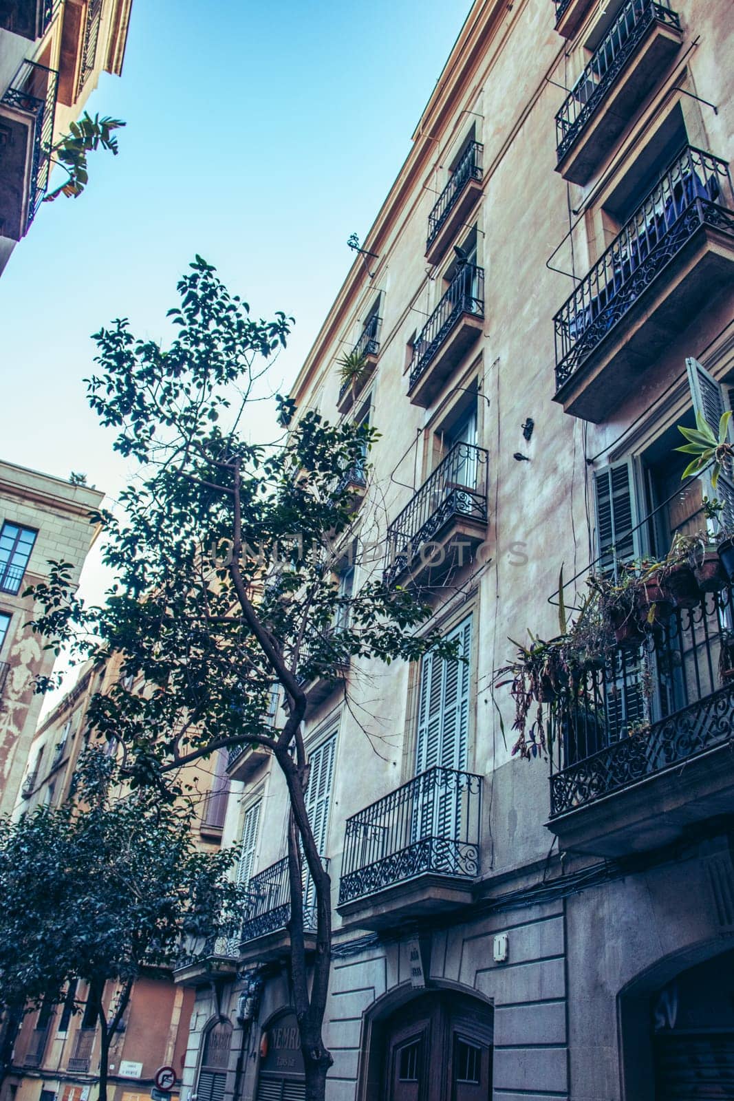 Empty street at day time in Barcelona, Spain photo. Historical building on Rambla street cityscape image. Beautiful urban scenery photography. Street scene. High quality picture for wallpaper, article