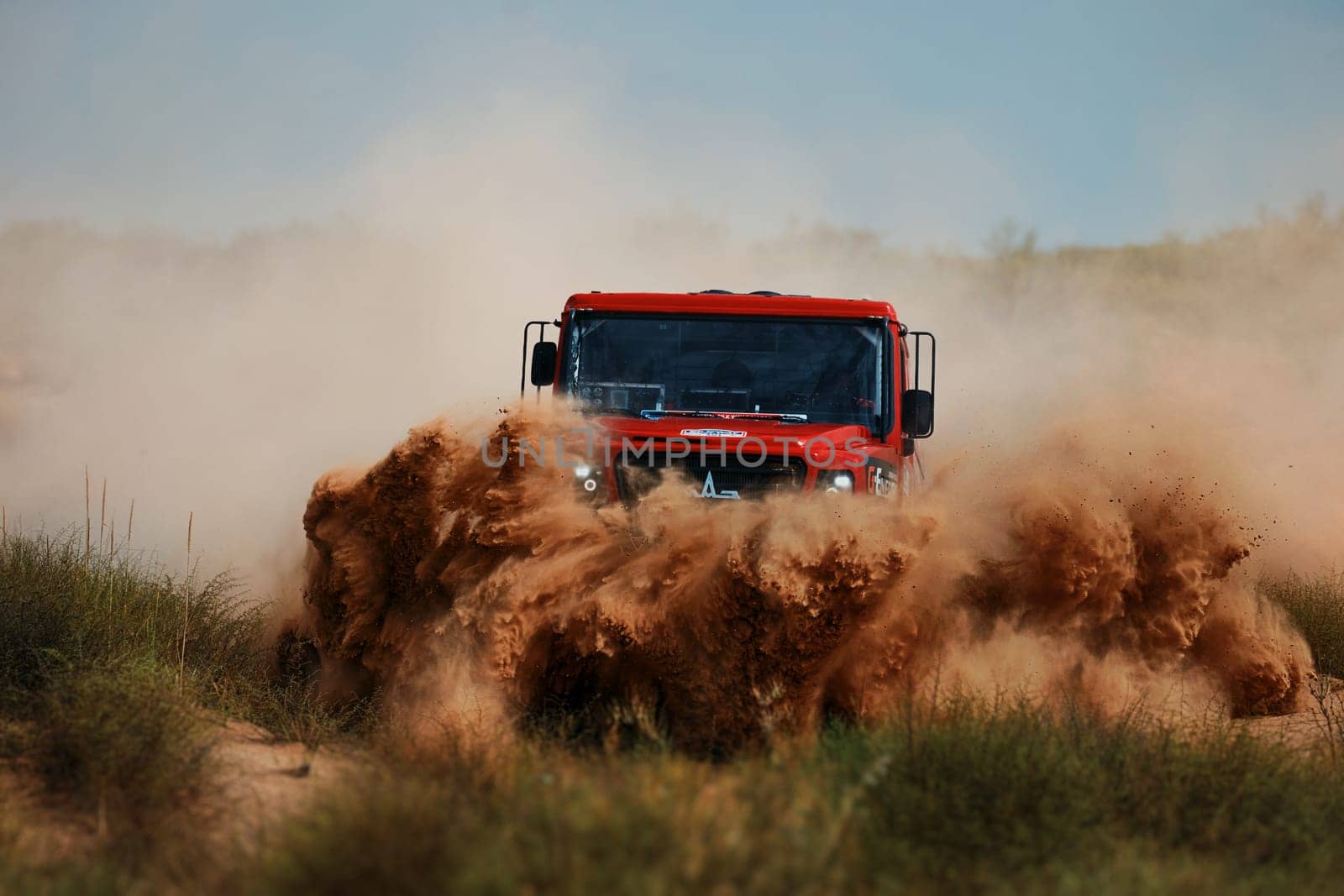Extreme off-road racing. Sports truck MAZ Sport-auto team gets over the difficult part of the route during the Rally raid in sand. 14.07.2022 Kalmykia, Russia by EvgeniyQW