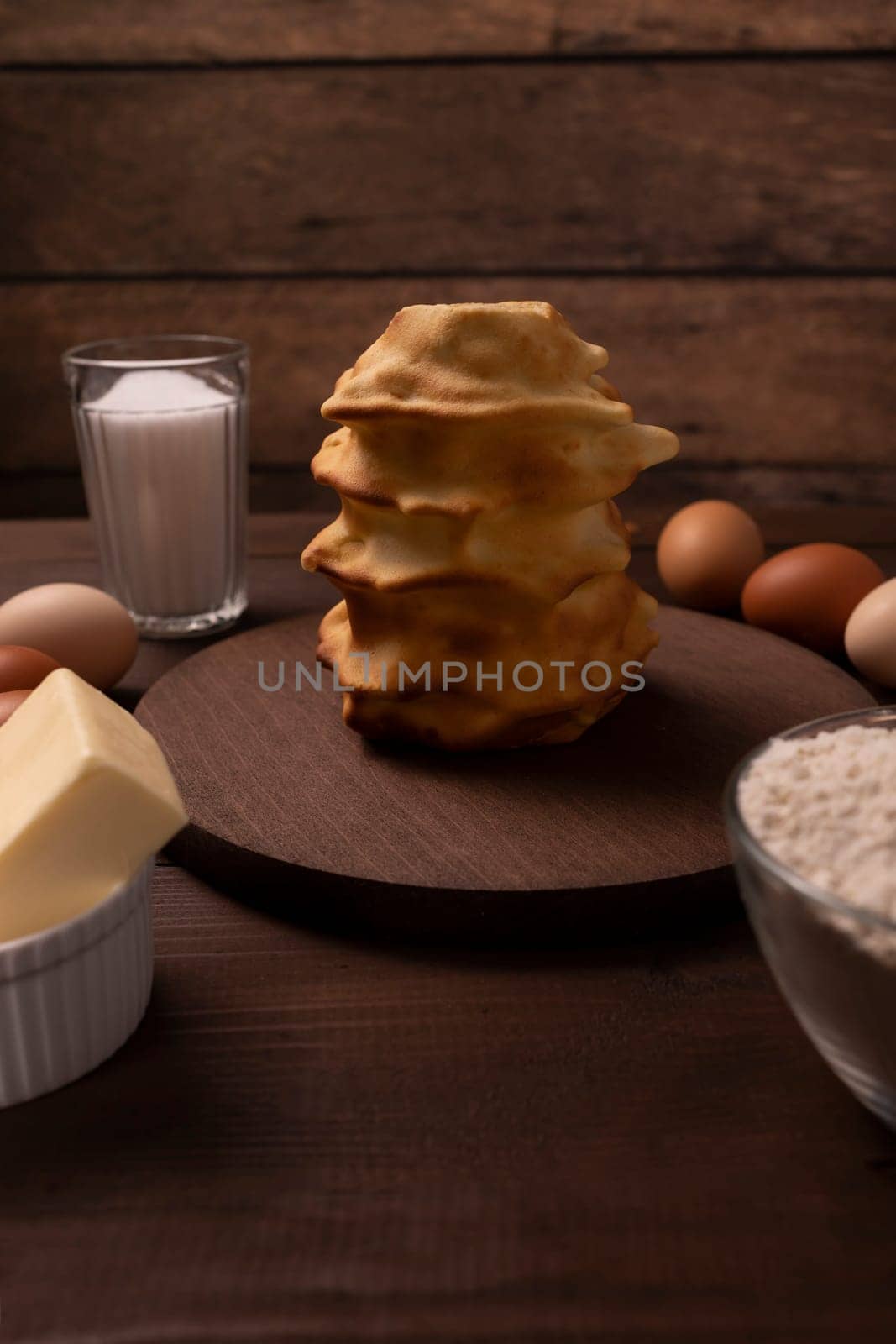 Set Of Ingredients For Baking Baumkuchen, Sakotis, Handmade sekacz On Wooden Table, Traditional Spit Cake Of Lithuanian, Polish, German,belarusian Cuisine Made Of Butter,eggs, Flour,sugar. Vertical
