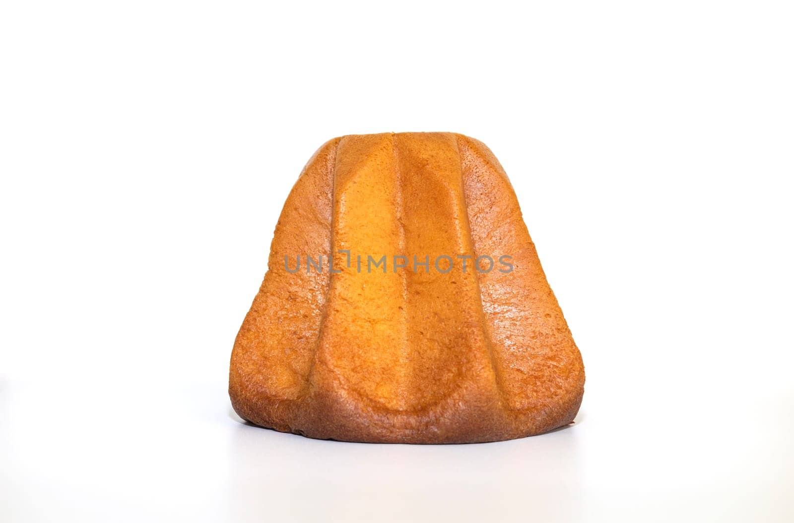 Isolated Baked Pandoro Cake on White Background, Traditional Italian Sponge Christmas Cake, Bakery. Delicious Holiday Pastry. Horizontal Plane. High quality photo