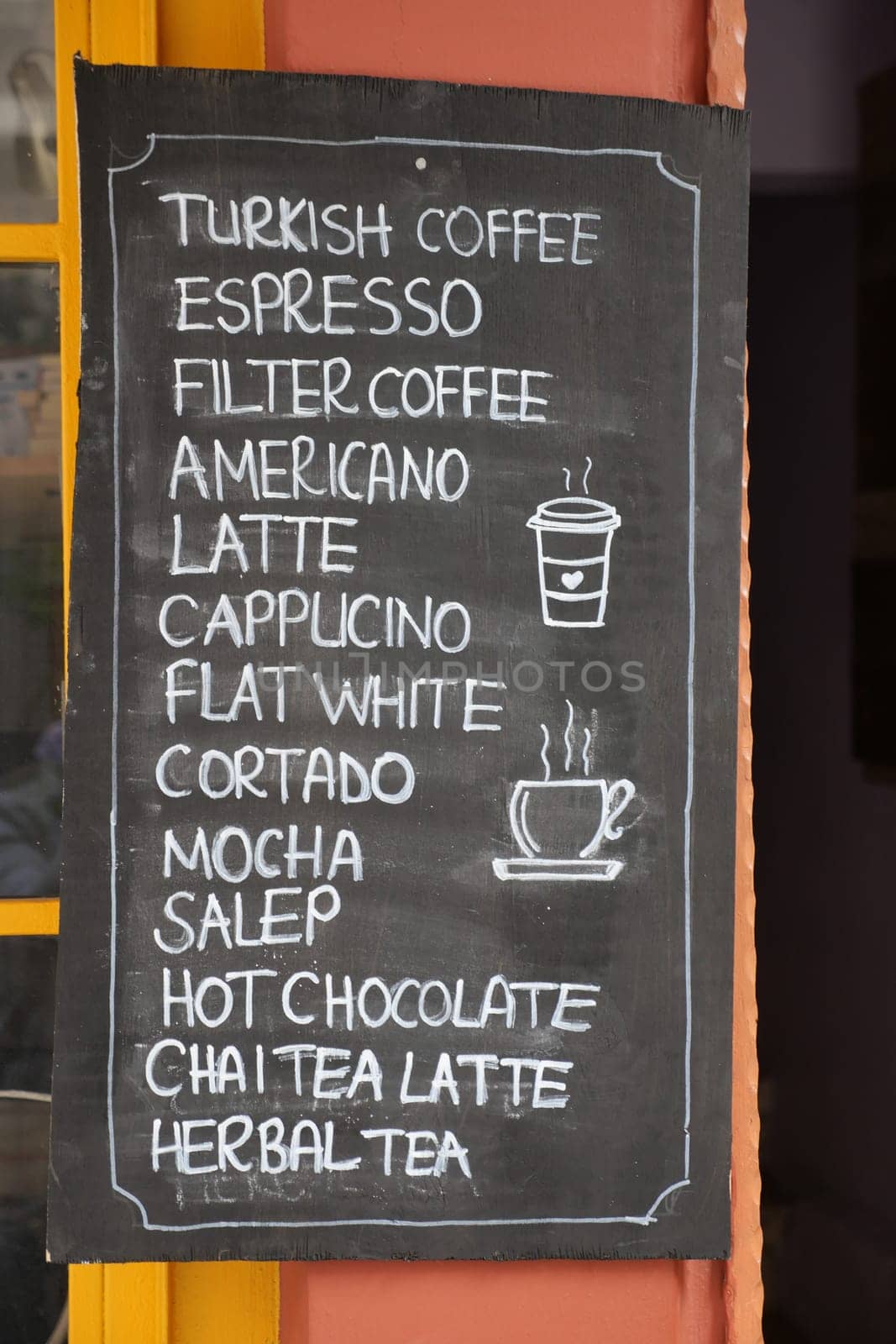 Cafe menu on black board outdoor .