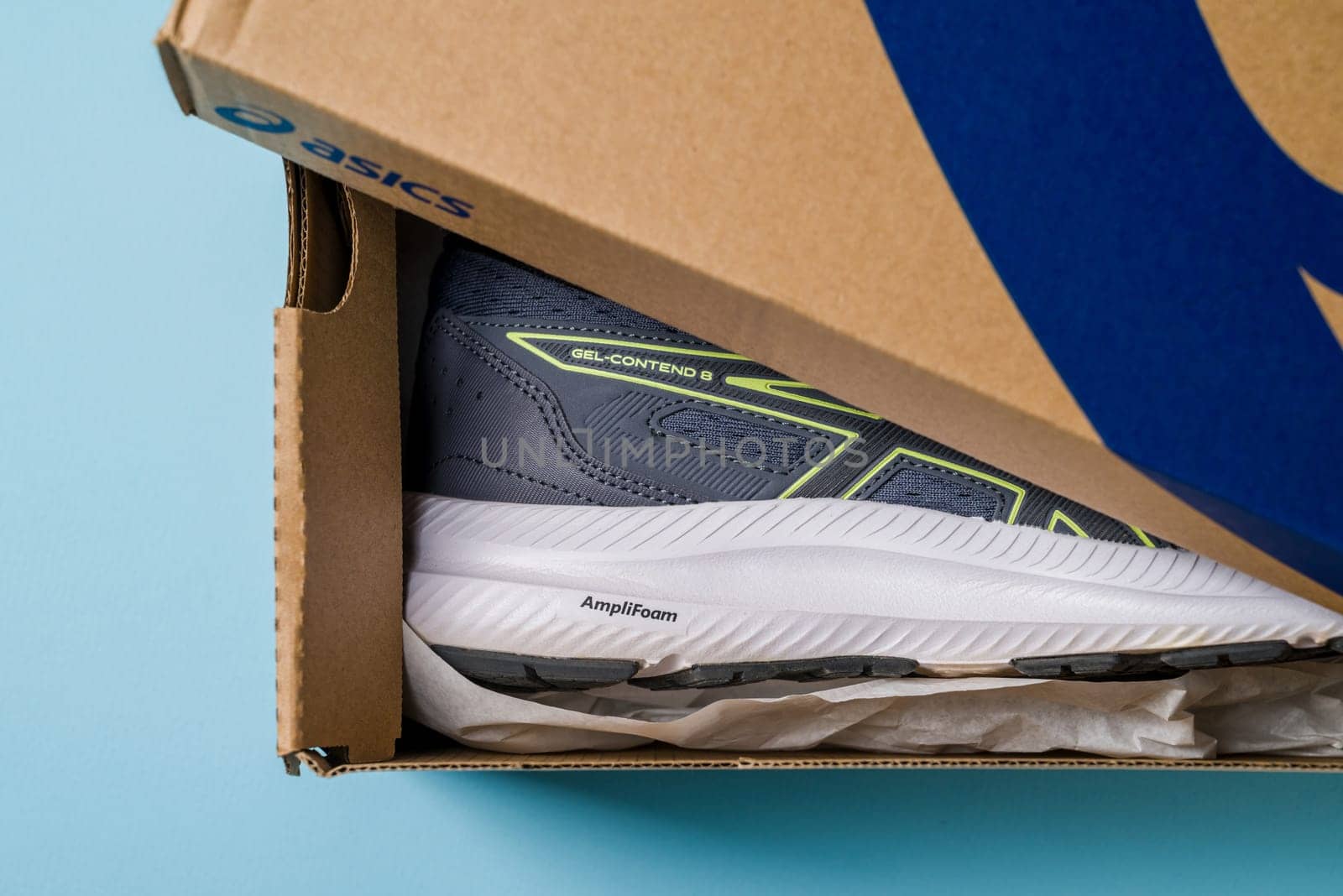 Antalya, Turkey - November 28, 2023: Asics running shoes with new technology soles in shoe box