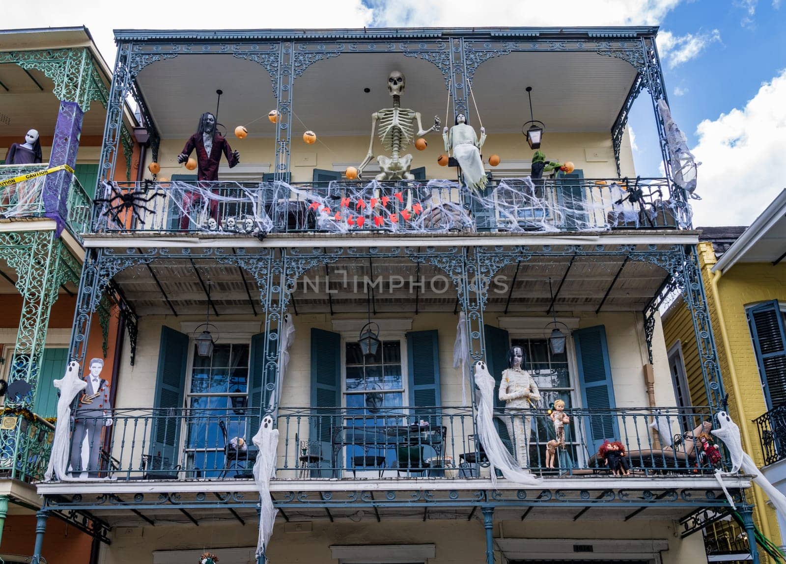 New Orleans, LA - 28 October 2023: Halloween decorations on tradional building in the French Quarter with wrought iron balconies
