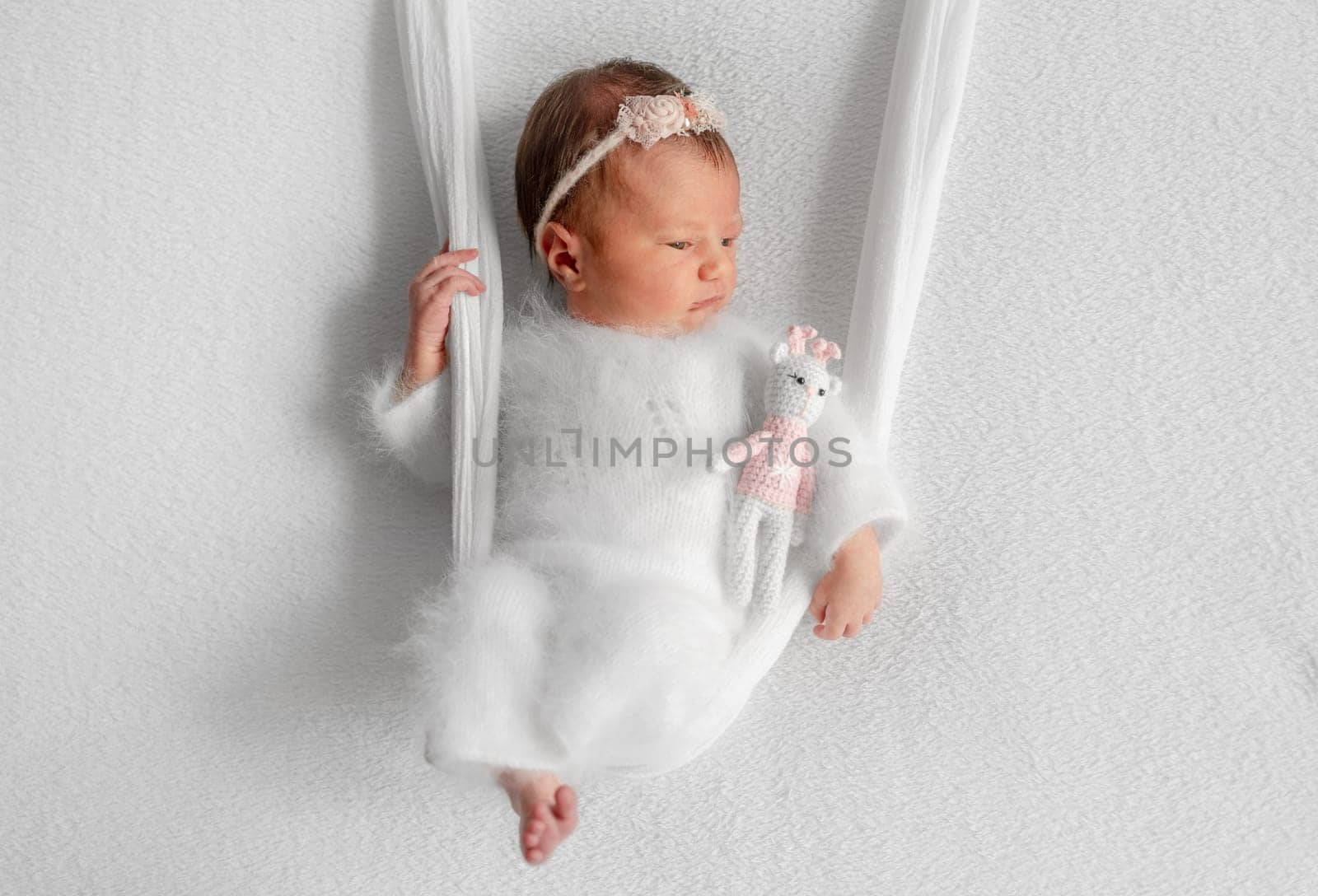 Newborn Girl On Makeshift Swing by tan4ikk1