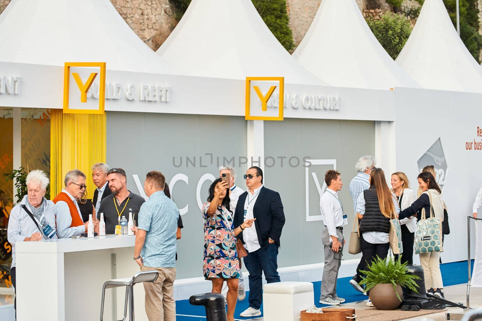 Monaco, Monte Carlo, 29 September 2022 - The famous motorboat exhibition, mega yacht show, clients and yacht brokers discuss the novelties of the boating industry, look at the mega yachts presented. High quality photo