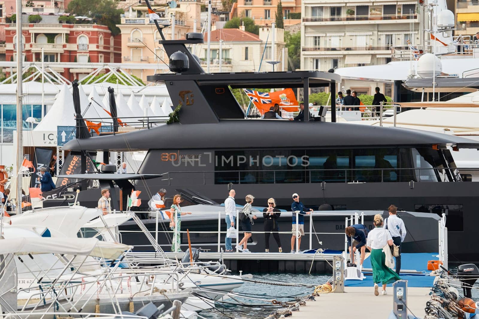 Monaco, Monte Carlo, 29 September 2022 - The famous motorboat exhibition, mega yacht show, clients and yacht brokers discuss the novelties of the boating industry, look at the mega yachts presented. High quality photo