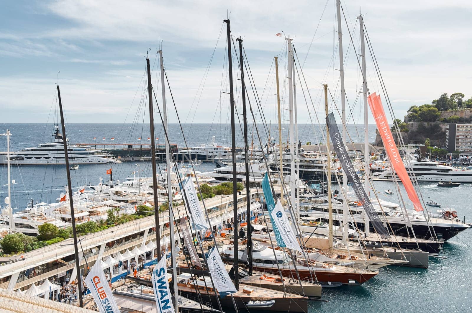 Monaco, Monte Carlo, 29 September 2022 - a lot of luxury yachts at the famous motorboat exhibition, the most expensive boats for the richest people, yacht brokers, boat traffic. High quality photo