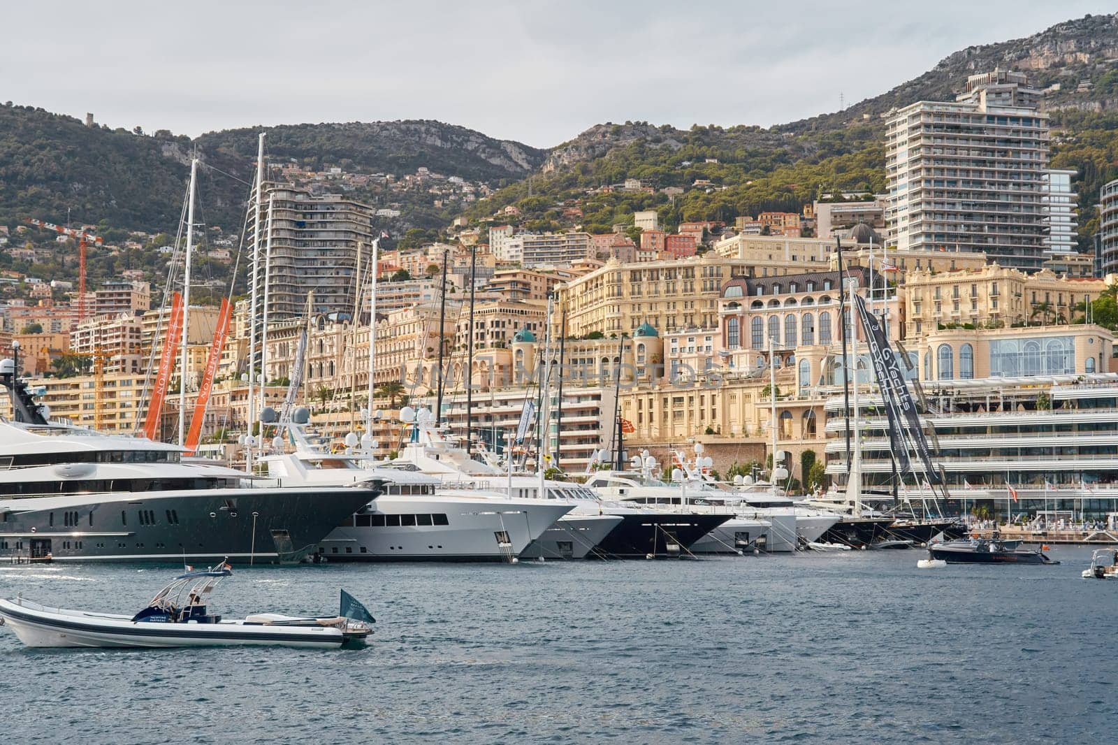 Monaco, Monte Carlo, 29 September 2022 - a lot of luxury yachts at the famous motorboat exhibition, the most expensive boats for the richest people, yacht brokers, boat traffic. High quality photo