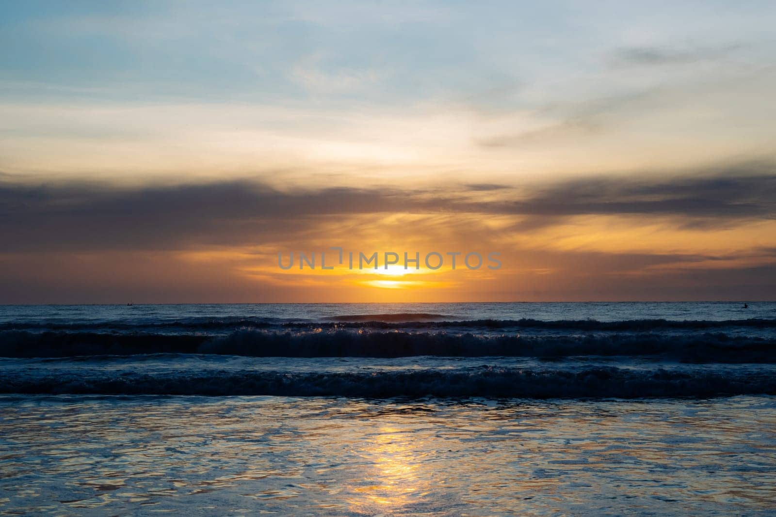 Affirmation photo You are free to be different Love yourself sunset over the sea horizon orange sky clouds dark sea water edge sand.