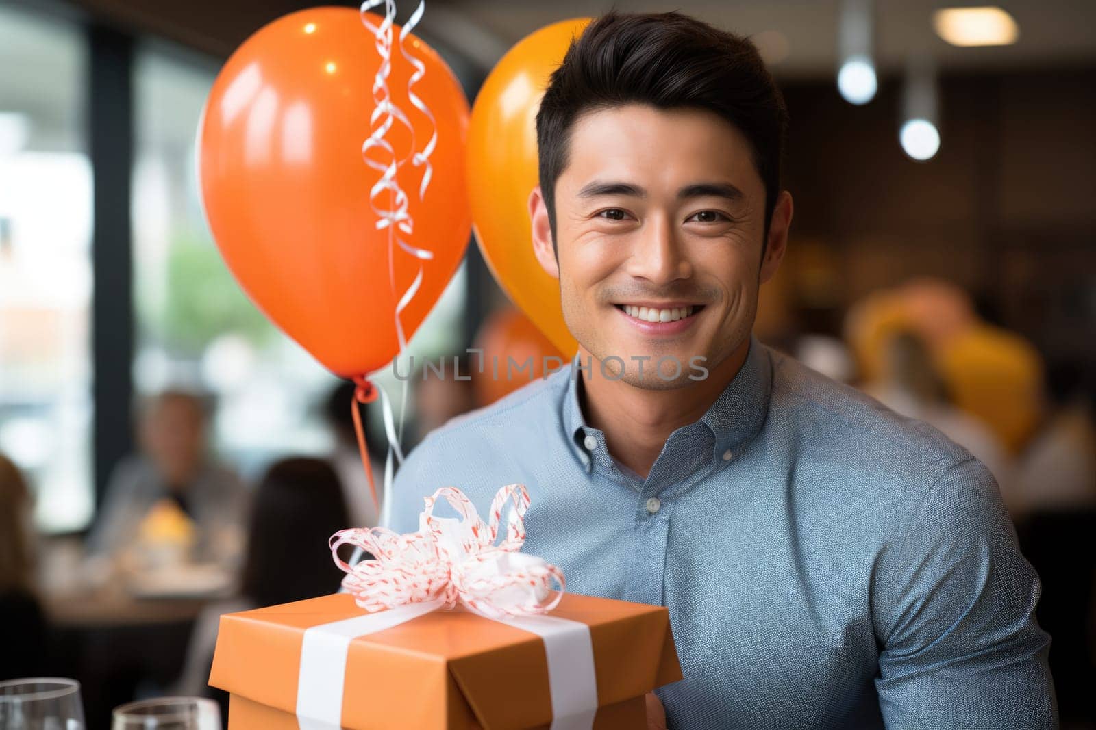 People, joy, fun and happiness concept. happy Asian birthday man holding with gift box, balloons in the background. AI Generated