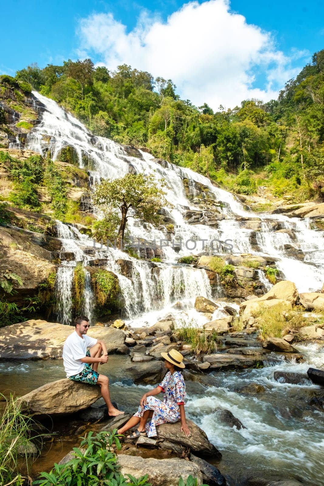 Mae Ya Waterfall Doi Inthanon national park Thailand Chiang Mai, couple visit waterfall in Thailand by fokkebok
