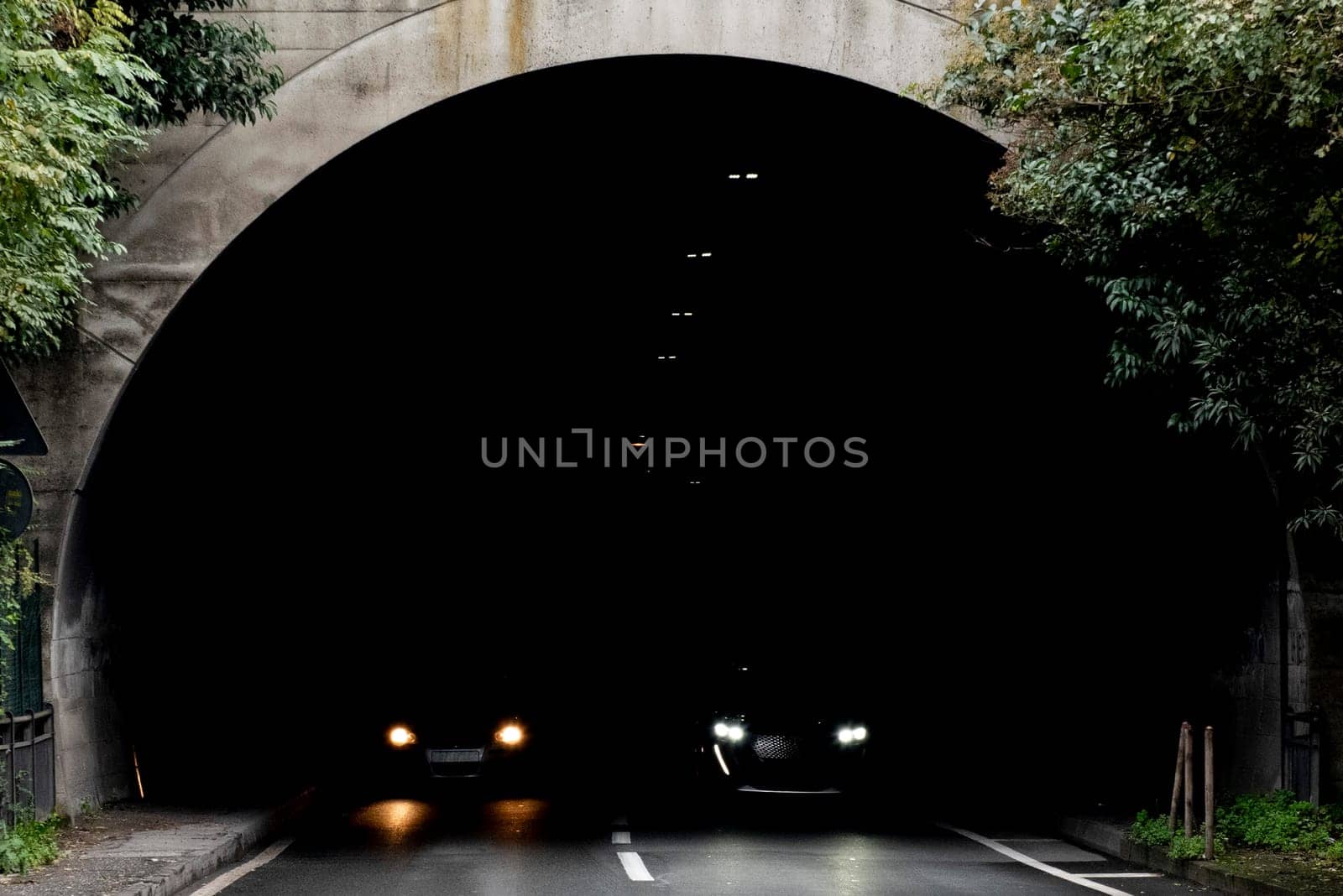 cars coming out from tunnel by AndreaIzzotti