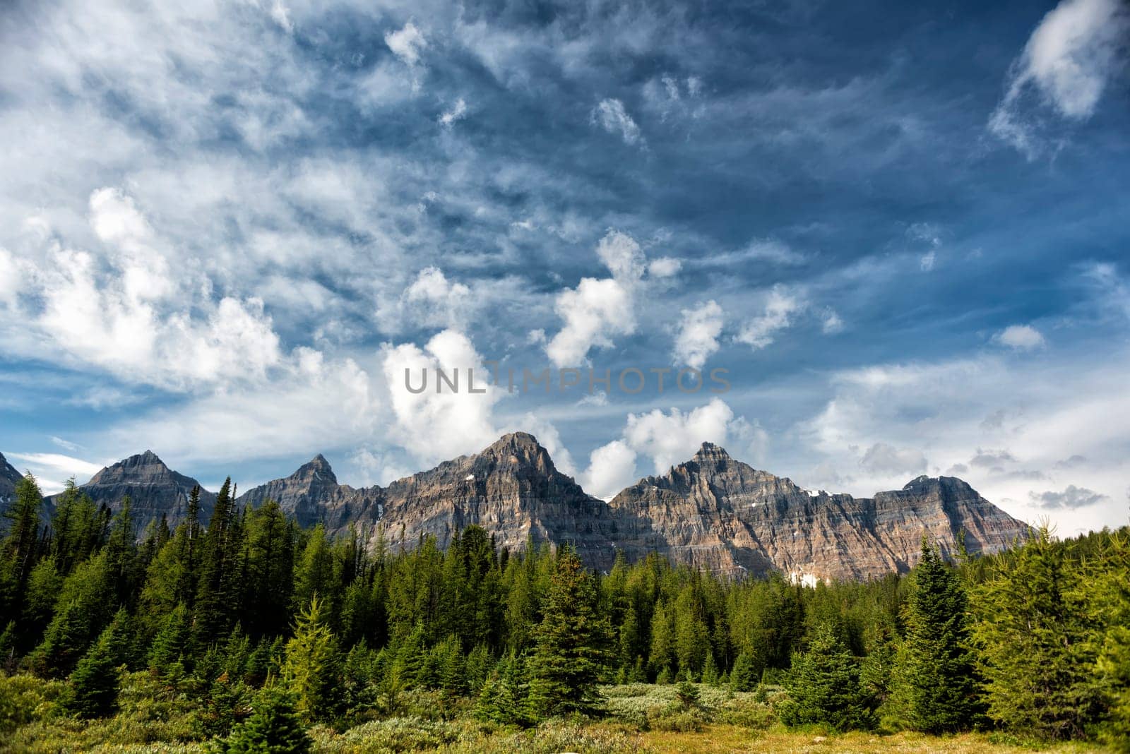 Canada Rocky Mountains Panorama on cloudy sky