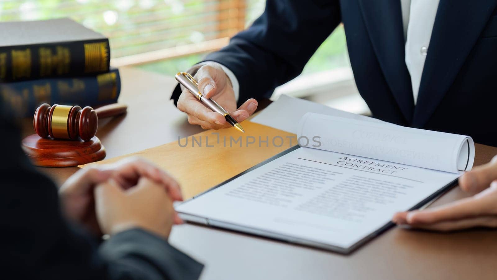 Businessman and lawyer or judge consult having team meeting with client.