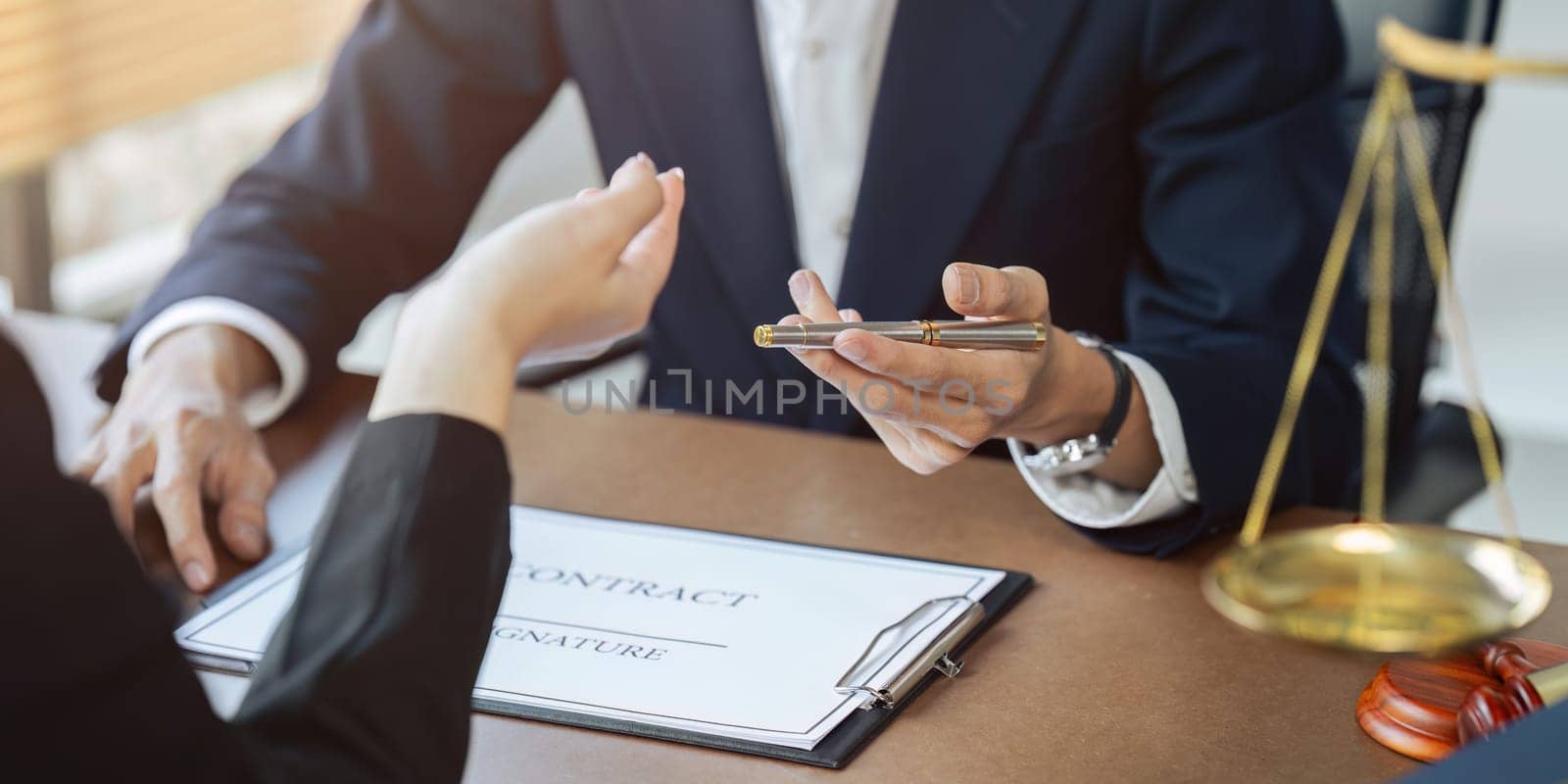 Businessman and lawyer or judge consult having team meeting with client.