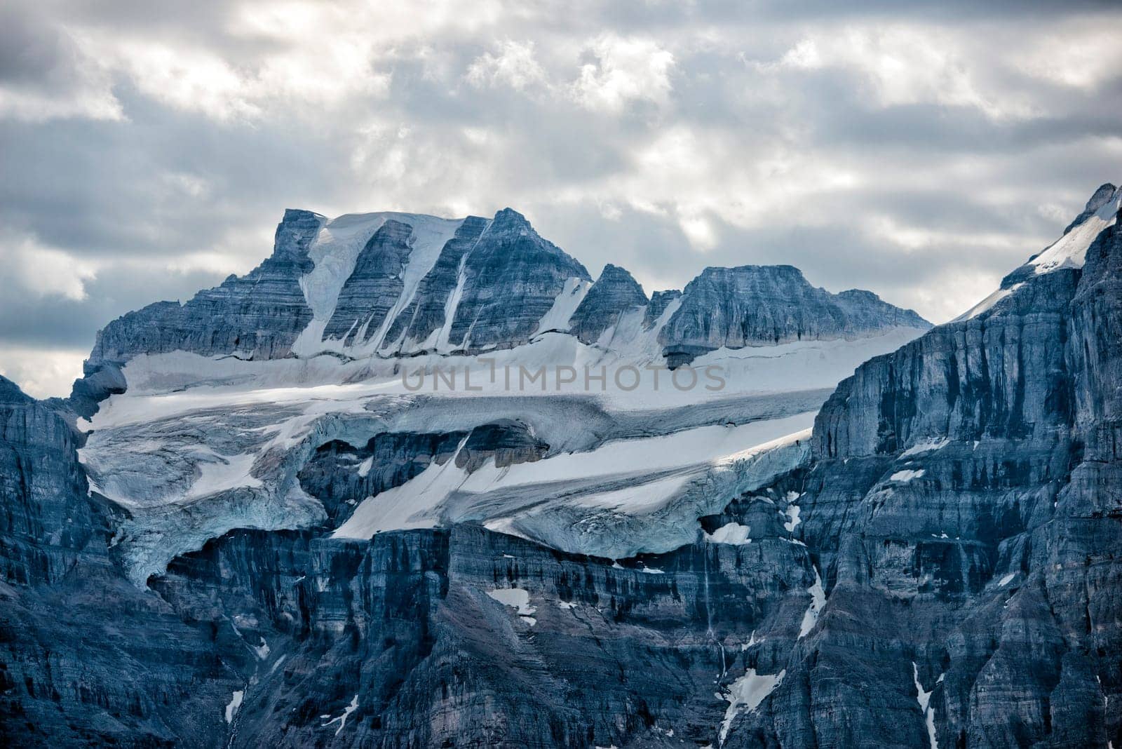 Glacier of Canada Rocky Mountains Panorama on cloudy sky