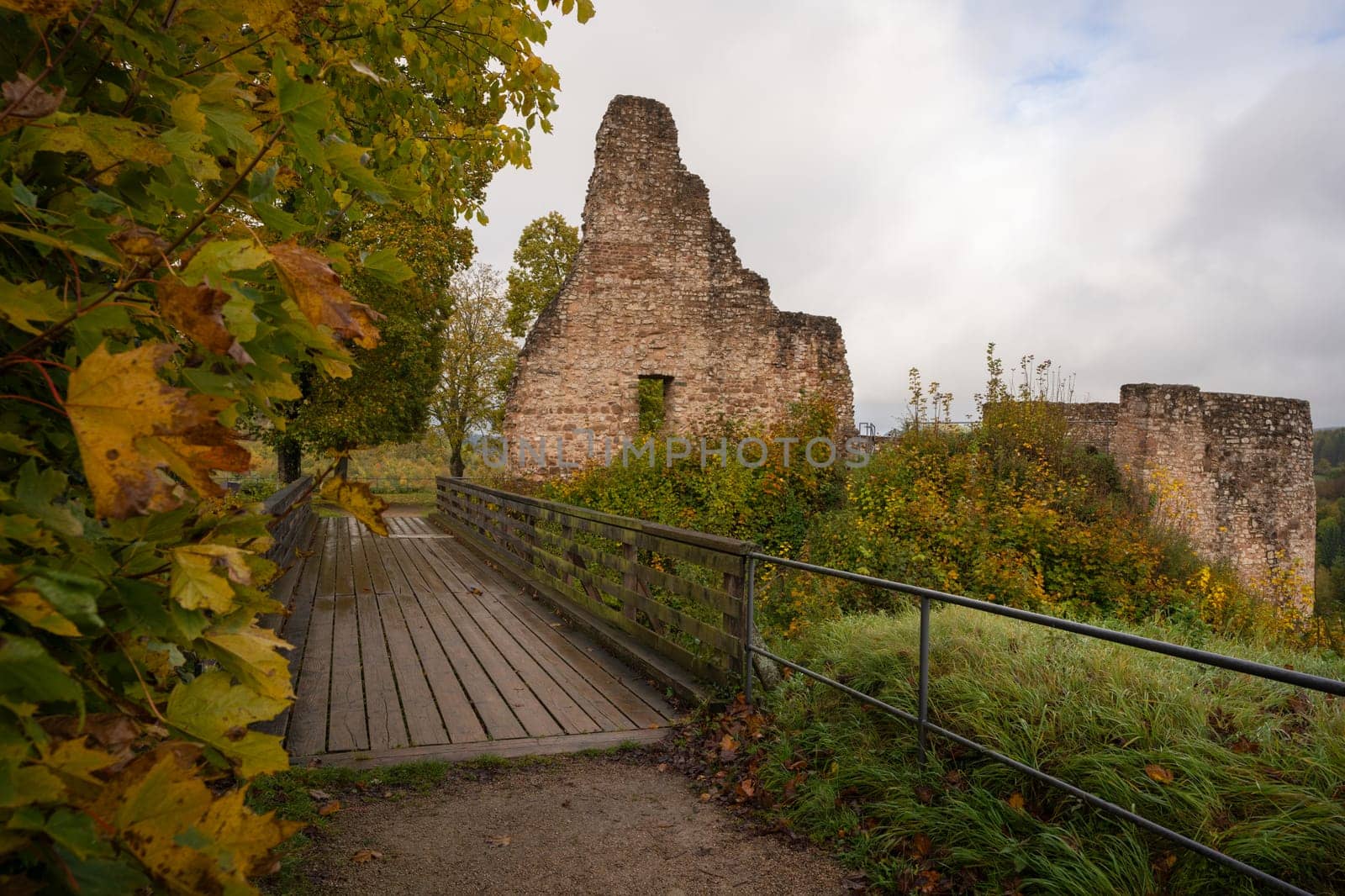 GEROLSTEIN, GERMANY - OCTOBER 22, 2023: Panoramic image of old Gerolstein castle in foggy light during autumn on October 22, 2023 in Eifel, Rhineland-Palatinate, Germany