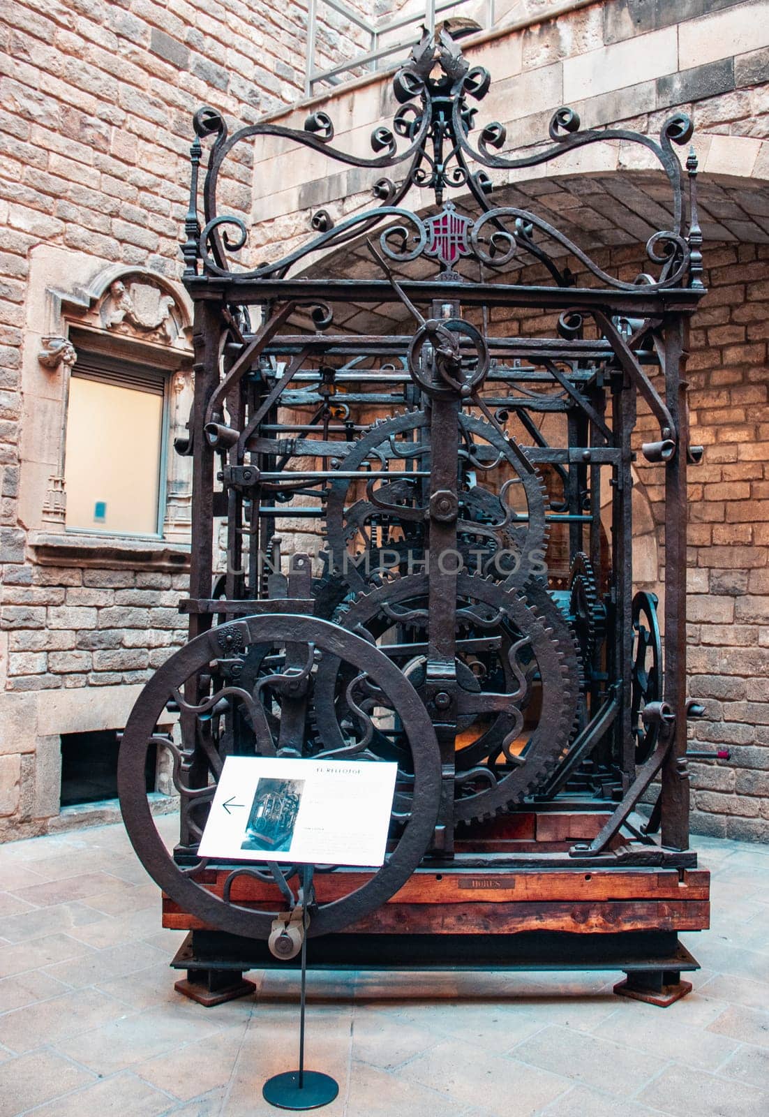 View of the mechanism of the turret clock in museum. Clockwork mechanism of church clock tower photo. by _Nataly_Nati_