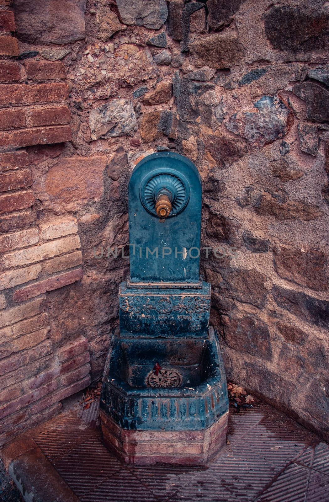 Water fountain in the farmland yard photo. Water pouring source. The exterior of an old farm photography. by _Nataly_Nati_