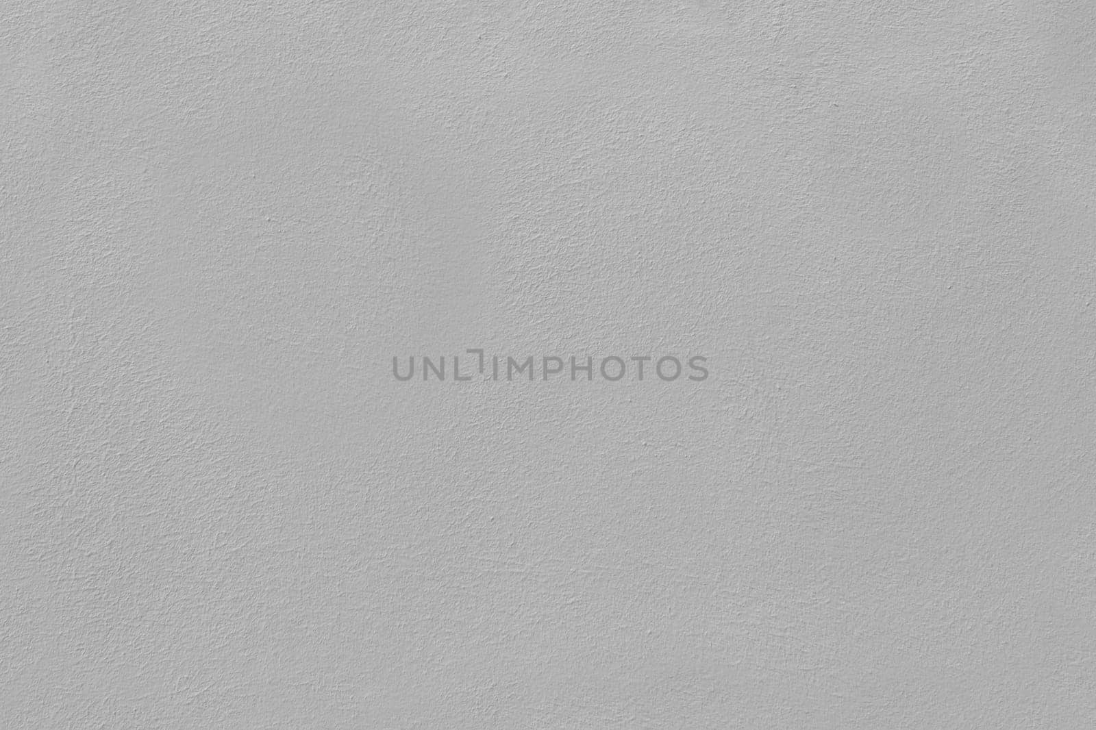 Light gray cement wall background in vintage style for graphic design or wallpaper.