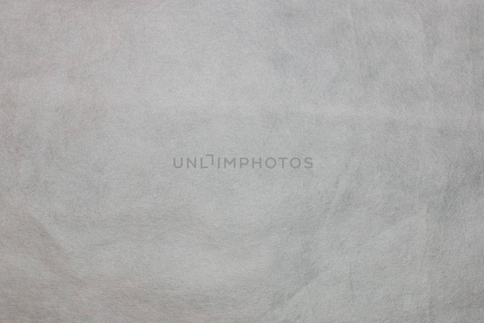 White non-woven fabric as a background texture. by gelog67