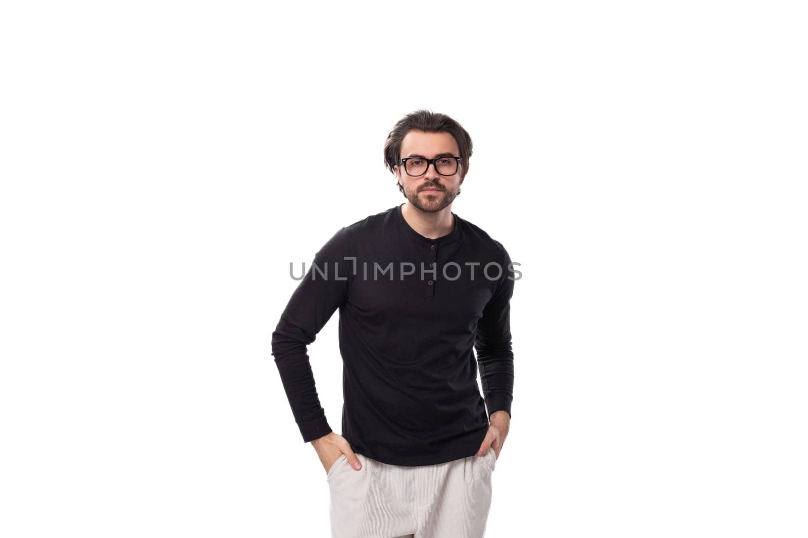 good vision concept. young brutal leader european man with beard and mustache wears glasses by TRMK