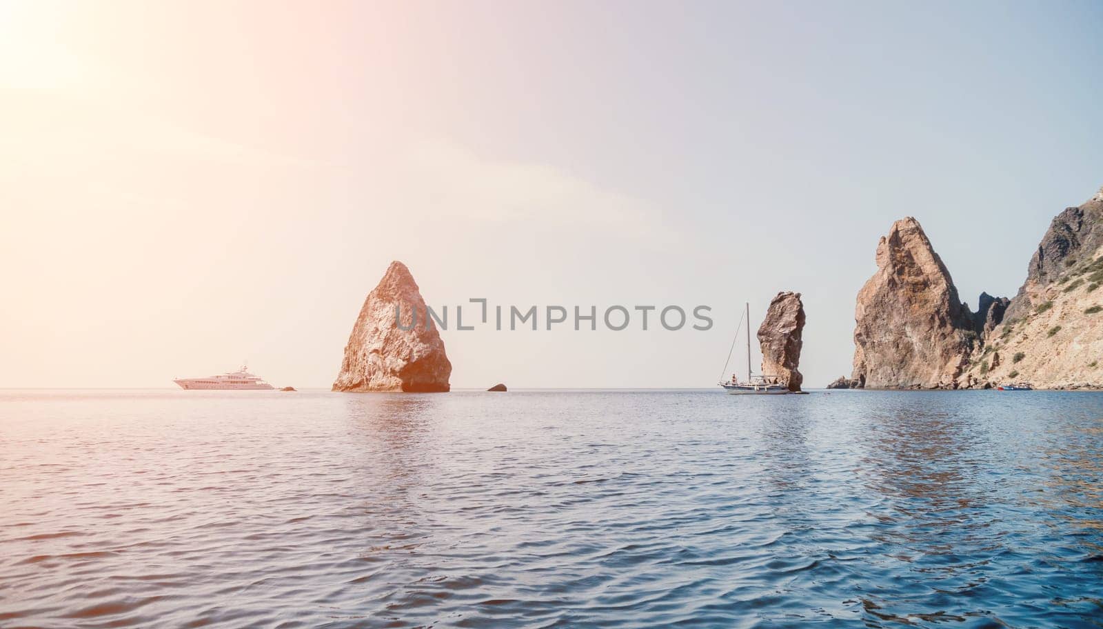 Woman sea sup. Close up portrait of happy young caucasian woman with long hair looking at camera and smiling. Cute woman portrait in bikini posing on sup board in the sea by panophotograph