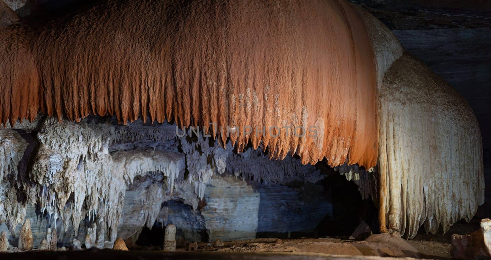 "Luminous cave formations display stunning geological wonders."