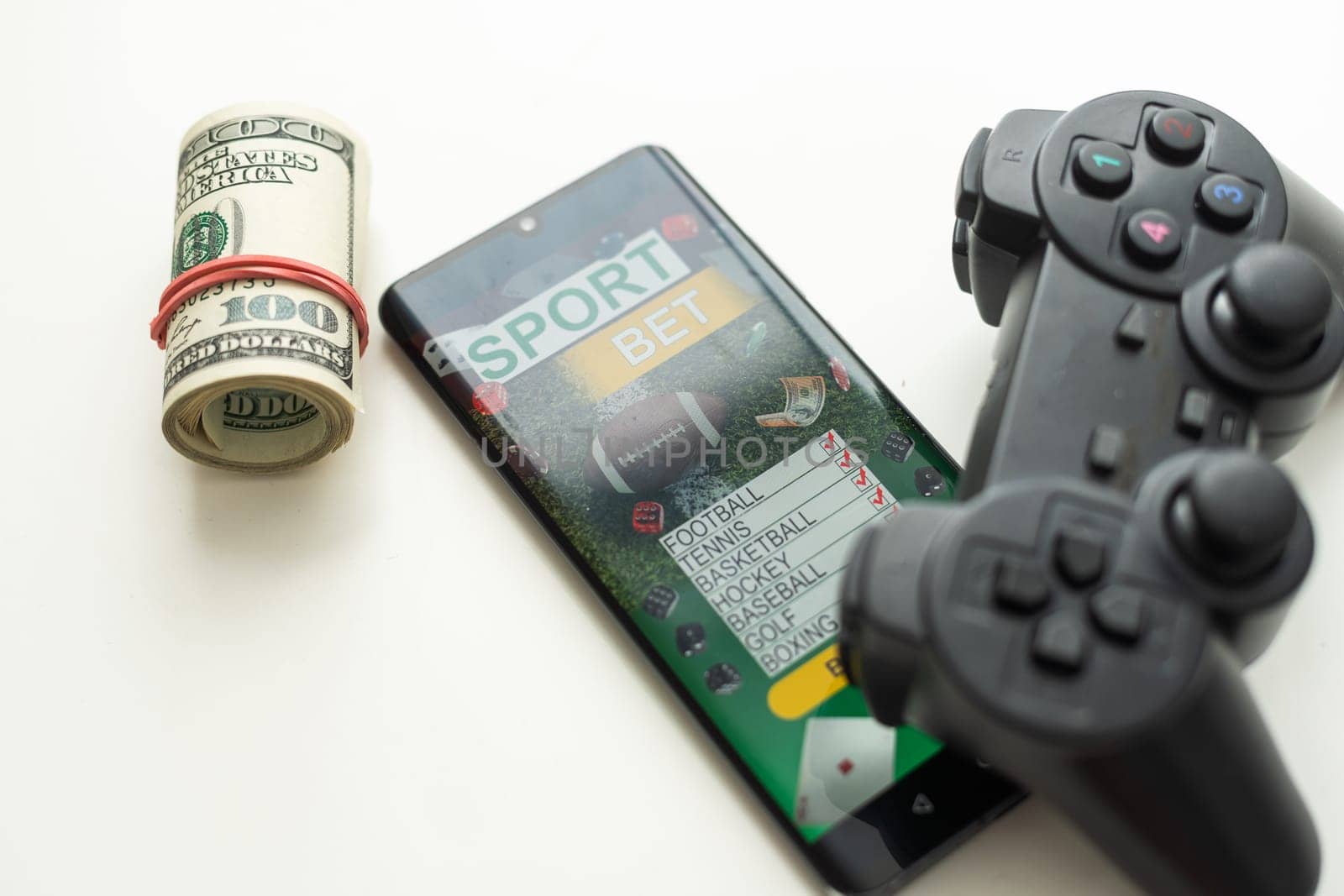 smartphone against gambling app screen.