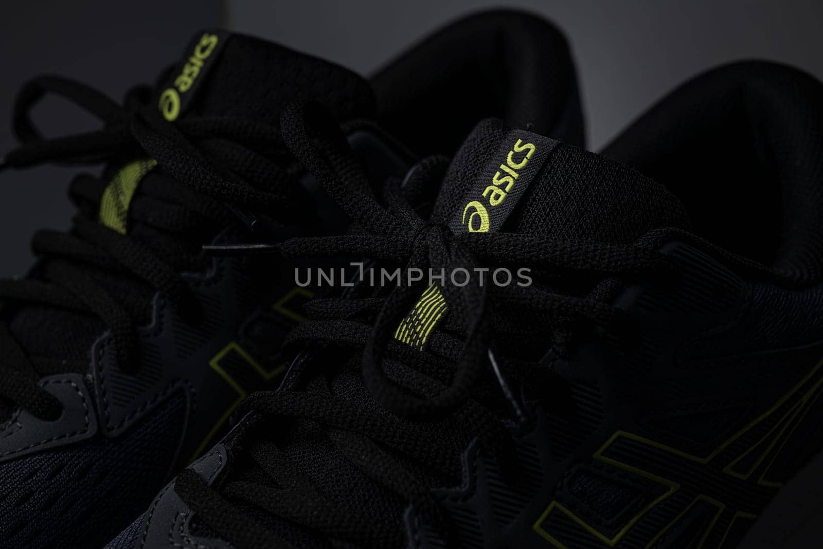 Antalya, Turkey - November 28, 2023: Close-up of the logo on Asics running shoes by Sonat