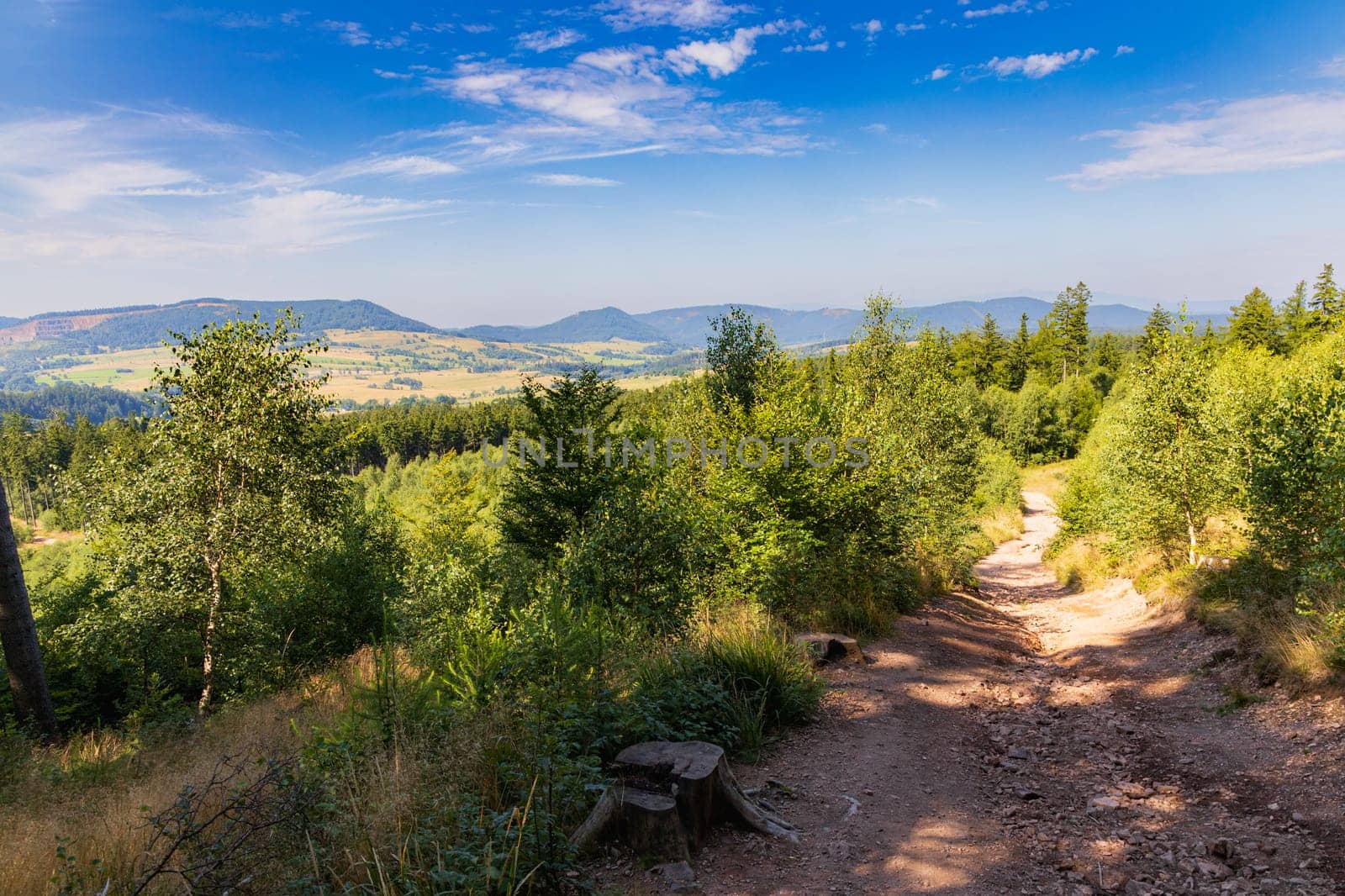 Beautiful green yellow and blue landscape in mountains seen from long and steep mountain trail by Wierzchu