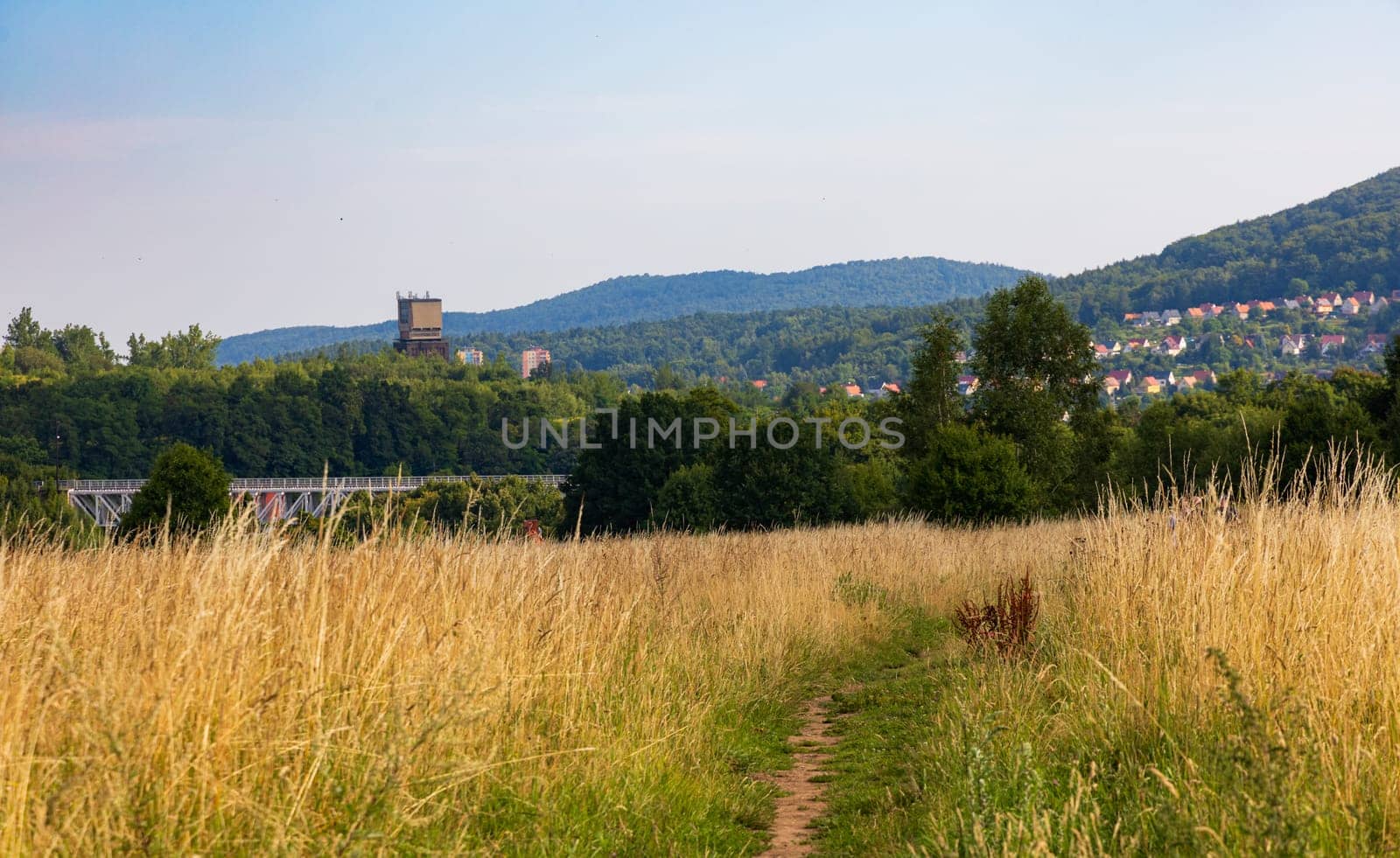 Beautiful green yellow and blue landscape in mountains seen from long and steep mountain trail by Wierzchu