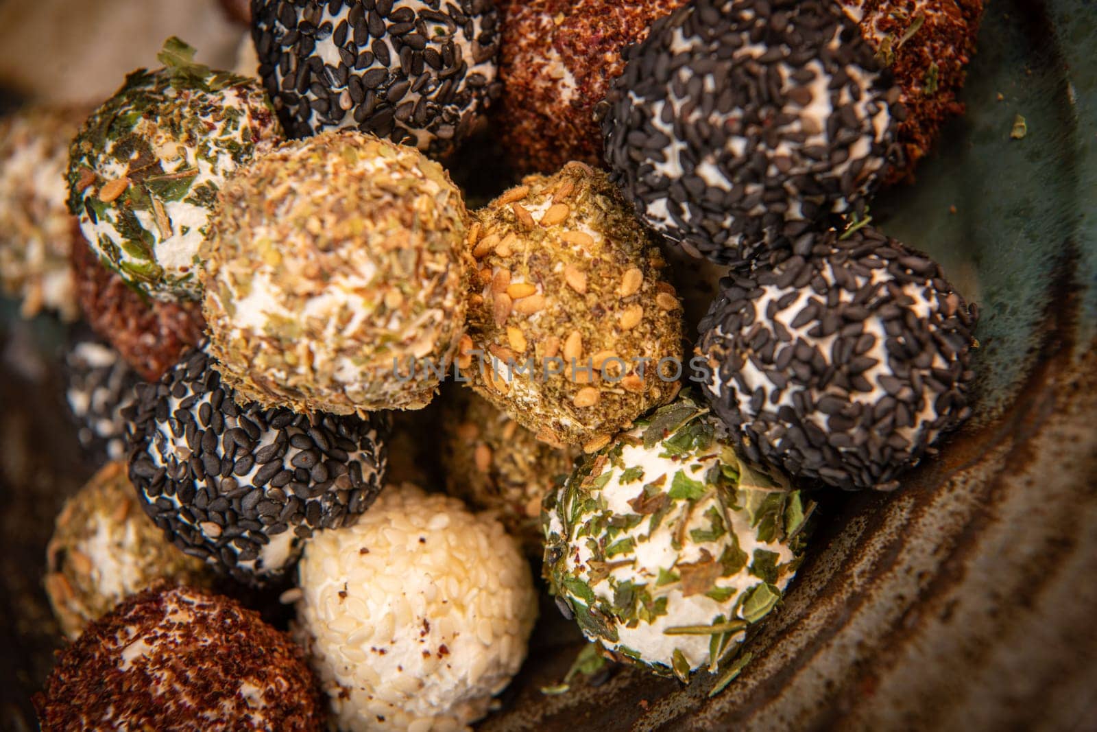 RECIPE FOR LABNEH CHEESE BOLLS WITH DRIED MINT, WHITE AND BLACK SESAME, SUMAC AND ZAATAR. High quality photo