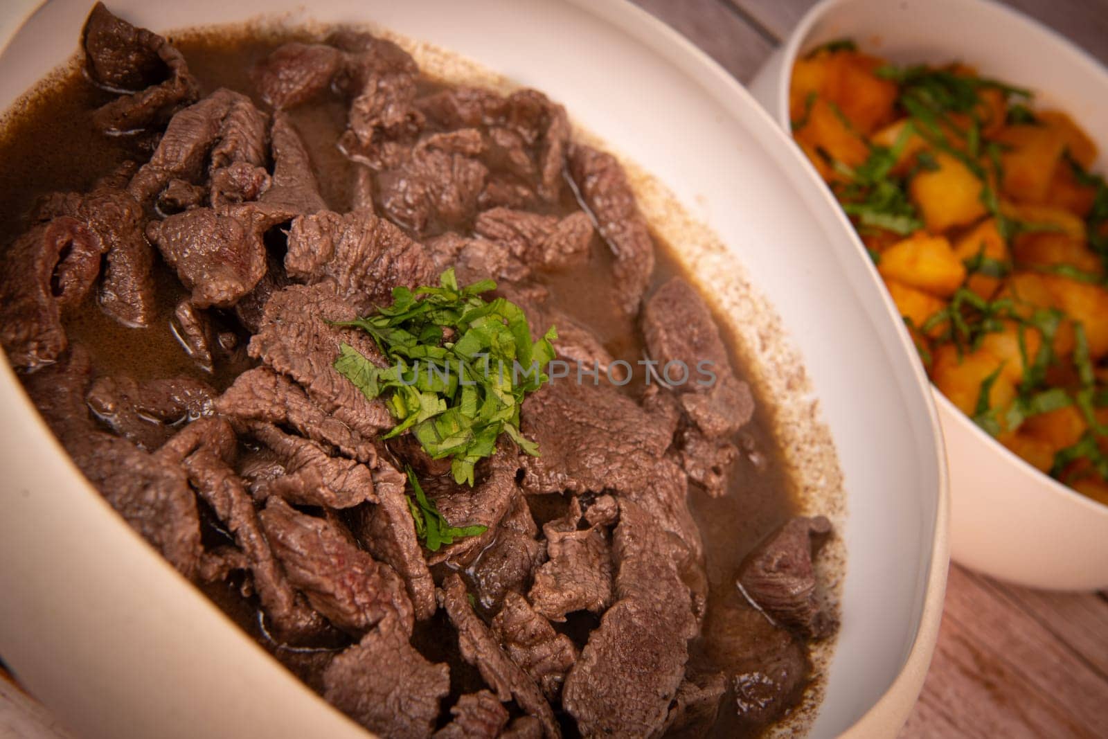 LEBANESE RECIPE, SHAWARMA, SPICY BEEF AND POTATOES, BATTATA HARA, GARLIC, CORIANDER AND PAPRIKA. High quality photo