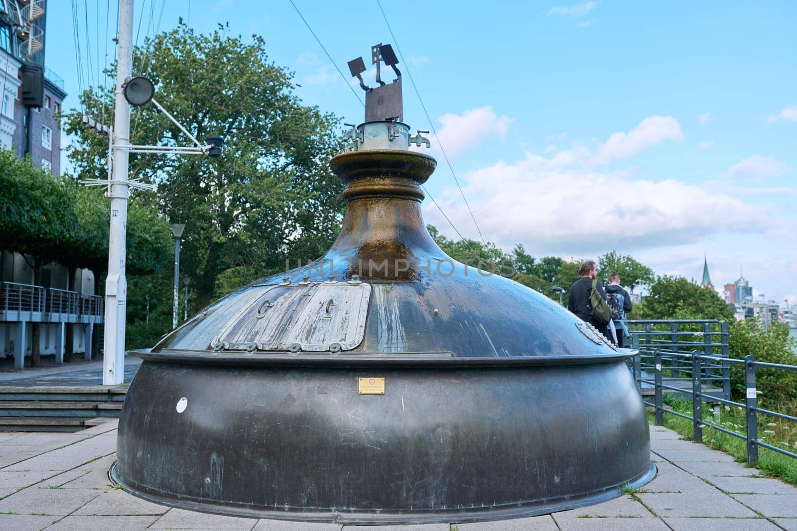 Hamburg, Germany, 1.08.2023, Old brewery tank fountain near Hamburg harbor, famous tourist location of Hamburg by VH-studio