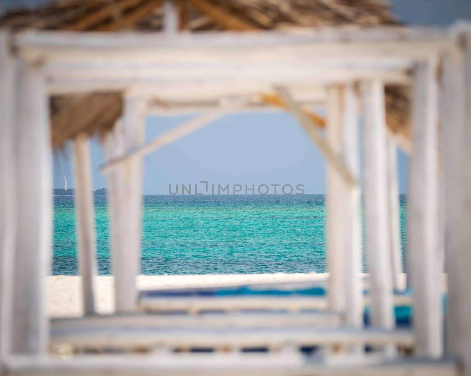 Seascape view background from wooden frame on the beach, summer concept, wonderful landscape nature view, luxury resort.