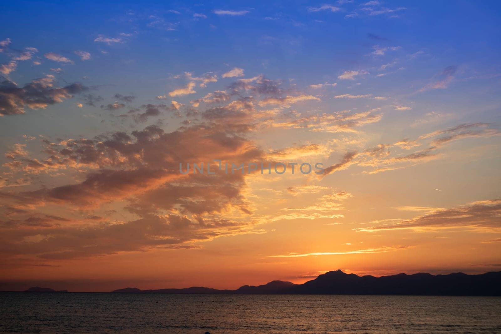 Photographic shot of the moment of a sunset over the sea 