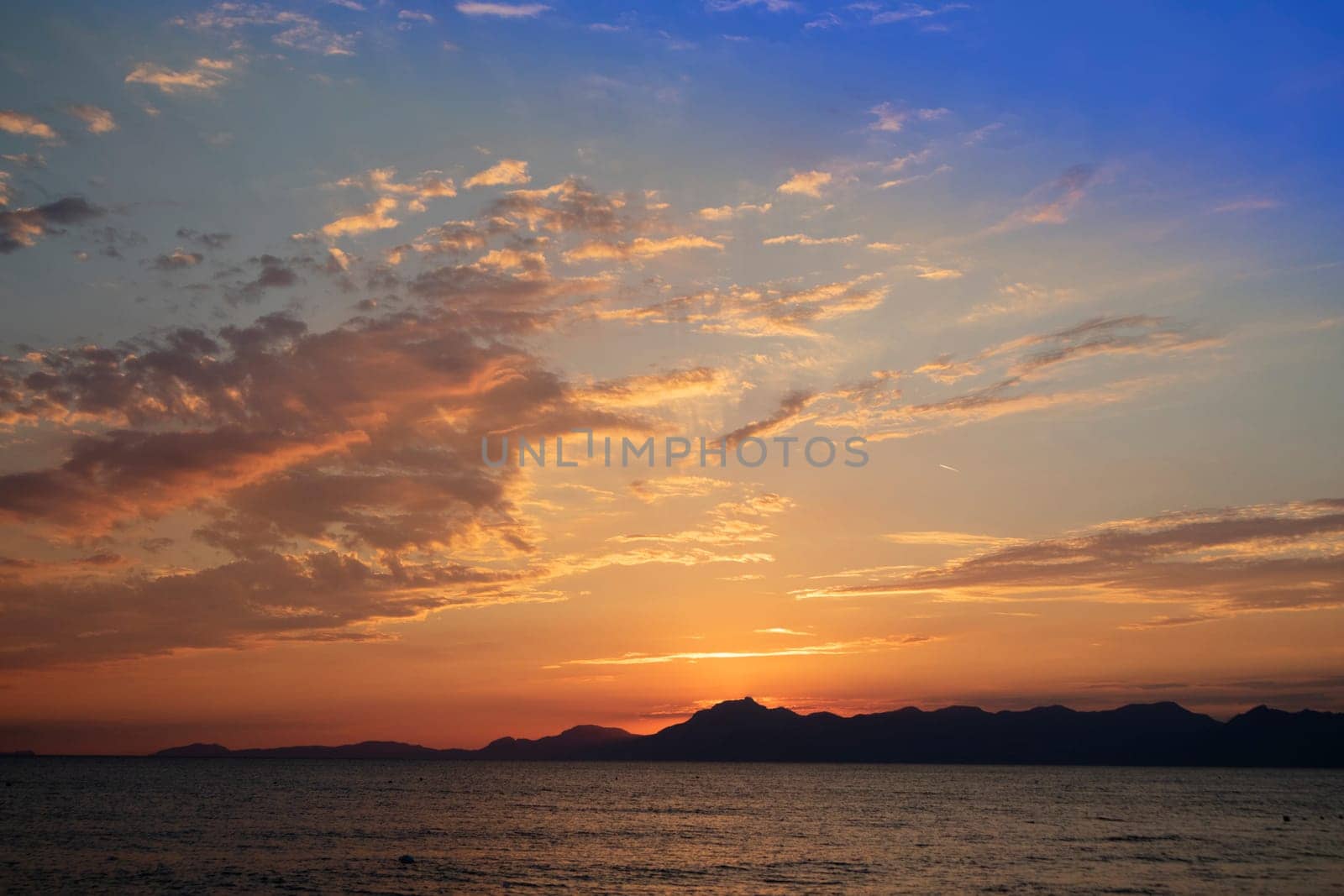 Photographic shot of the moment of a sunset over the sea 